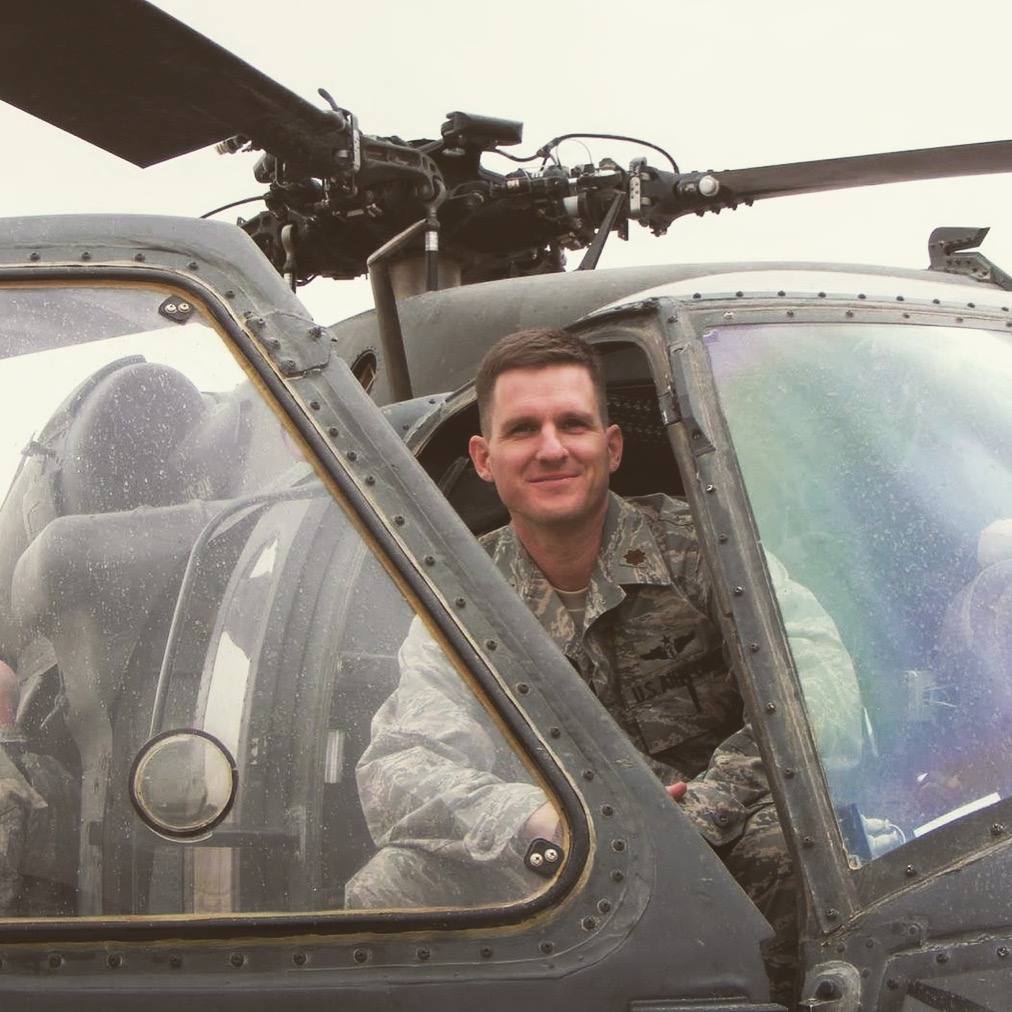 Dr. Brett Brimhall Flying a Military Helicopter