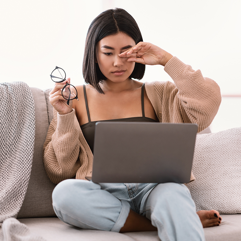 Woman rubbing her eyes because of eye allergies in Las Vegas NV