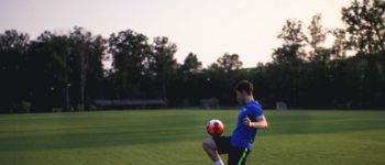 A man playing soccer