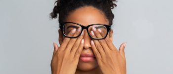 A woman with blurry vision after getting covid - covid eye problems